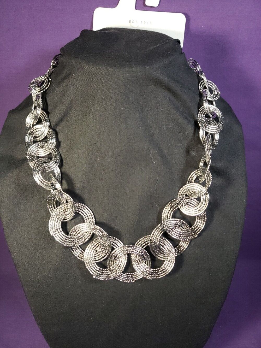 Cato "C Est. 1946" Silver Tone Ring Necklace, Graduating Linked Swirl Rings, NWT